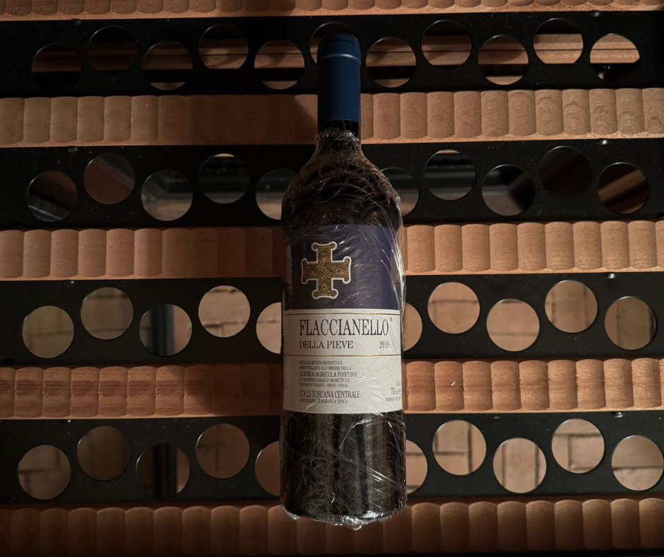 Why are the labels of some wine bottles covered with a transparent film?