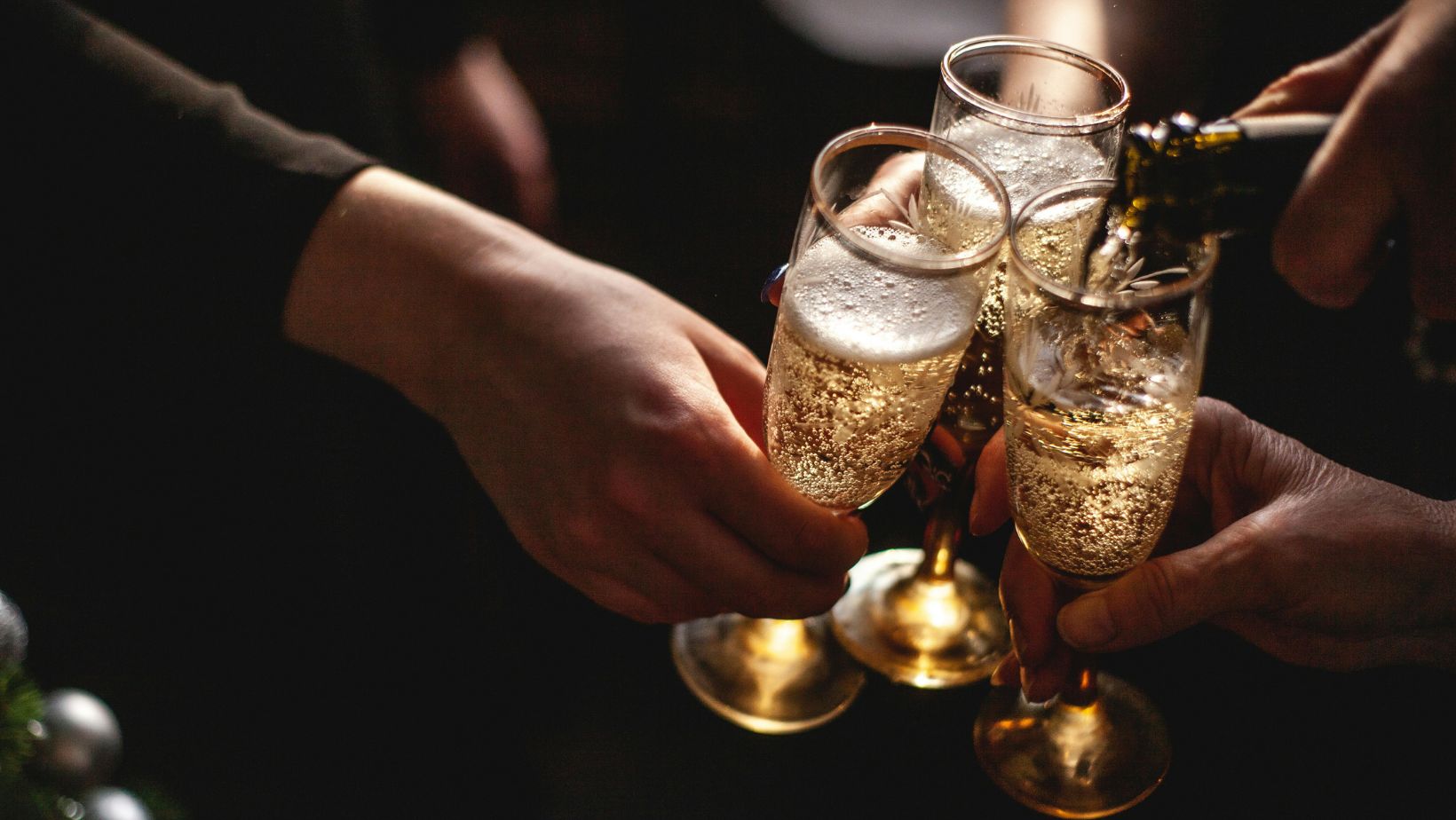 How high should you raise your glass during a toast?