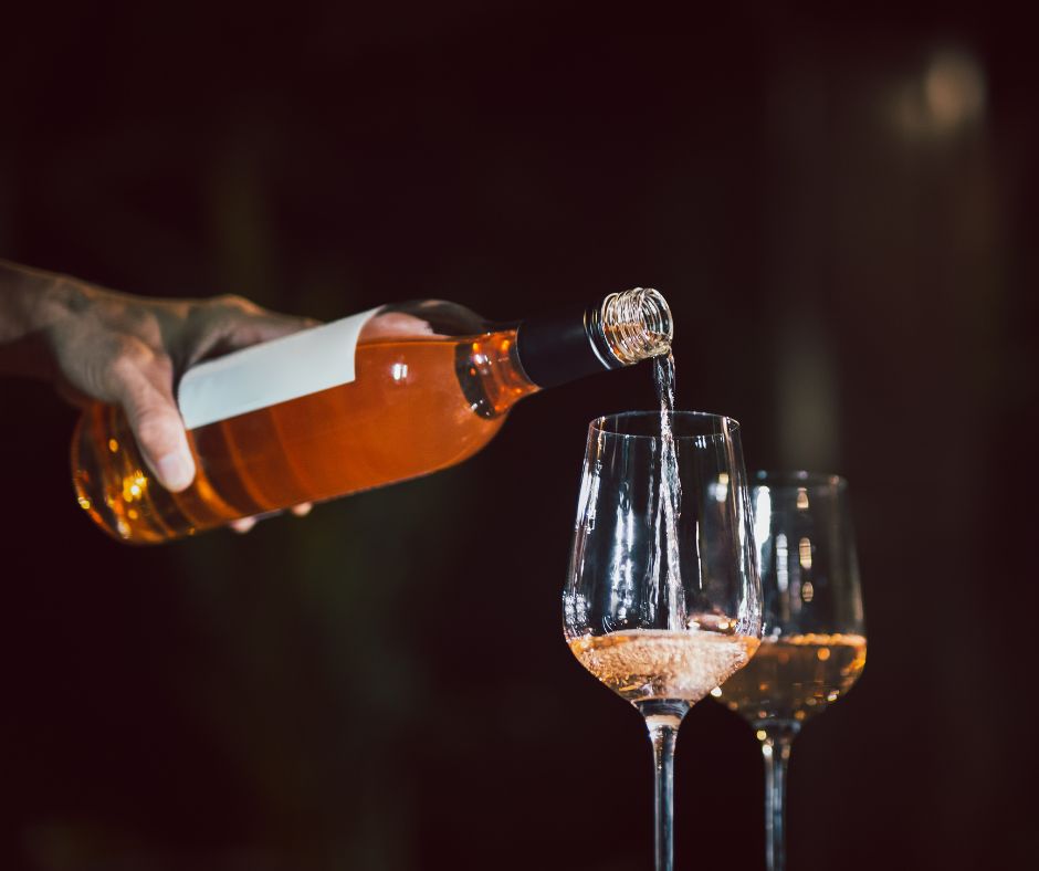 Who should pour the wine?