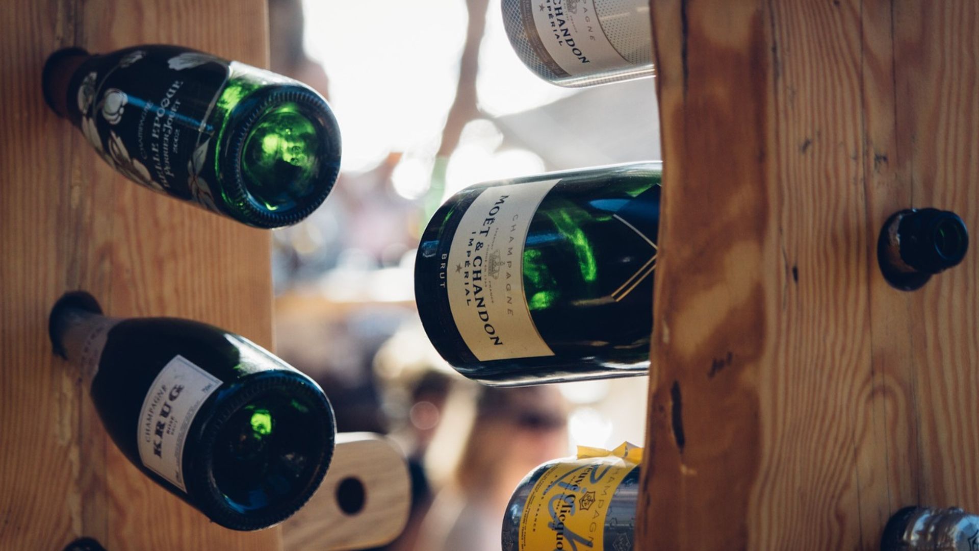 What is the purpose of the concave bottom of wine bottles?