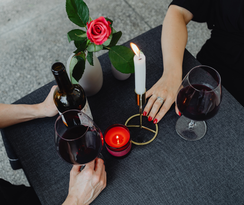 Where should I place the bottle of wine during a meal?
