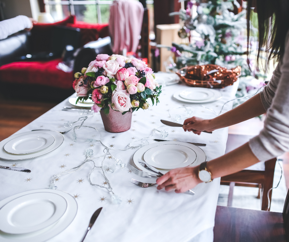 Where should we place the wine glasses on the table?
