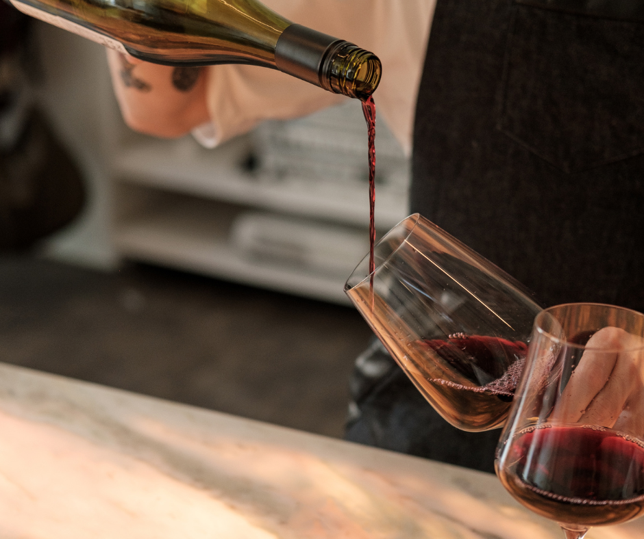 Should I tilt the glass when pouring wine?